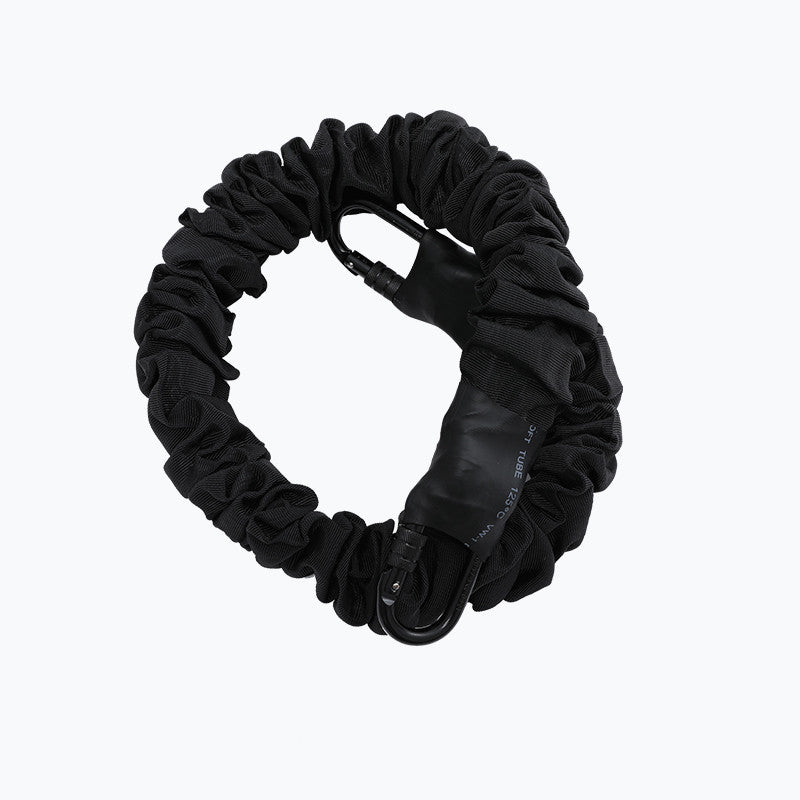 A black elastic luggage strap with a carabiner and a black leather loop, shown on a plain white background.