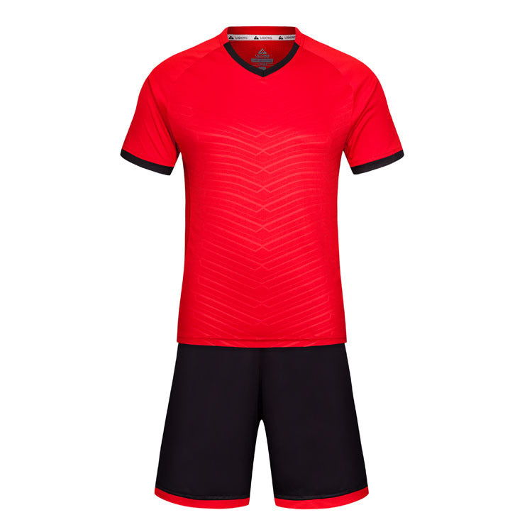 Red sports jersey with black shorts on a white background