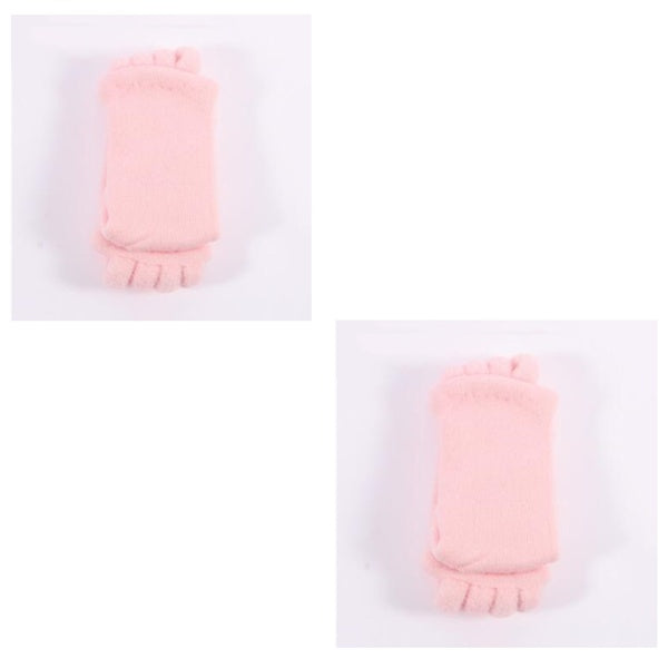 Two pink baby booties on a white background