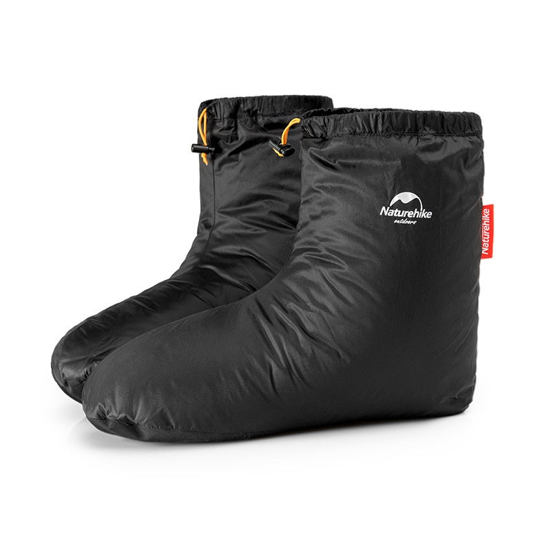 Black boot covers with a visible brand logo on a white background