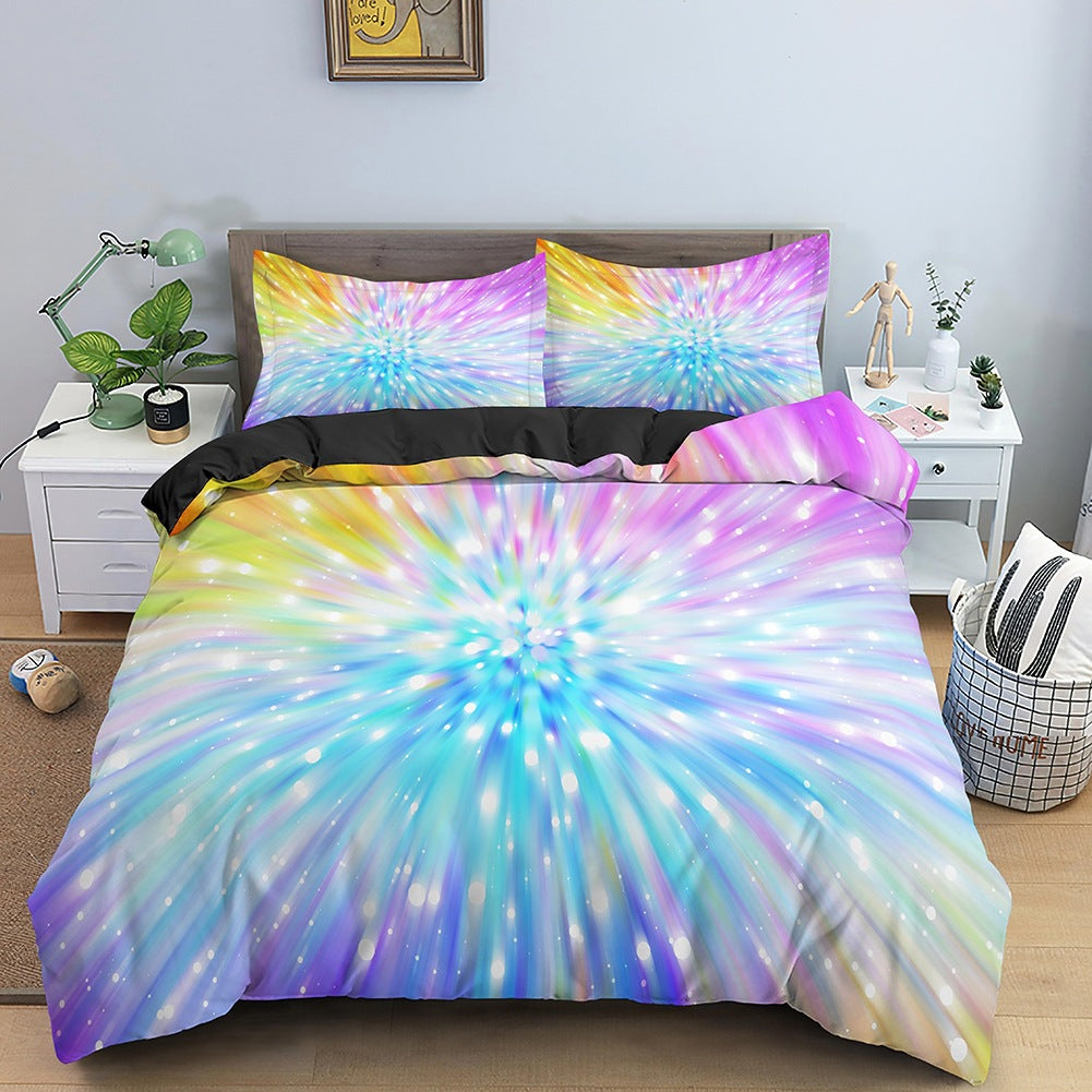 Tie-dye bedding set on a bed in a bedroom with nightstands and decor.