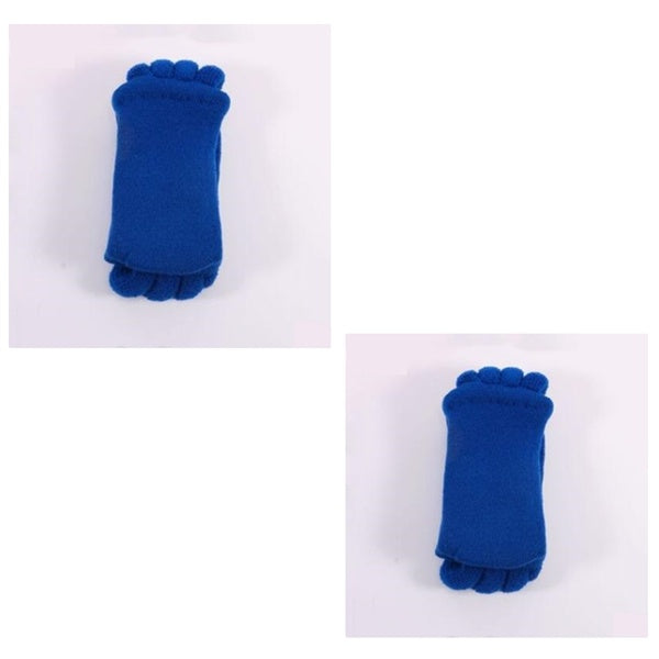Blue baby socks shaped like feet on a white background