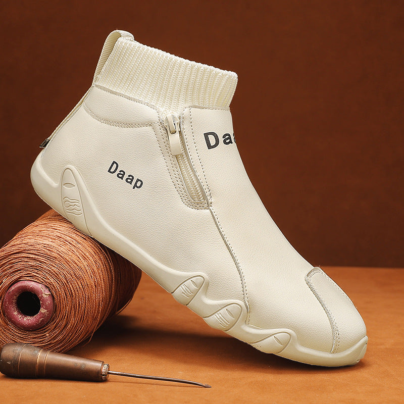 White sneaker with 'Daap' branding on a brown background