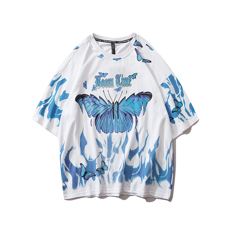 White t-shirt with blue butterfly designs and 'Boom Time' text on a white background