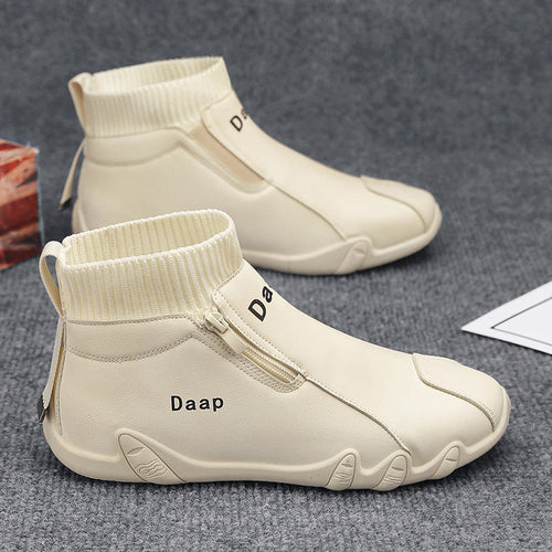 Beige high-top sneakers with 'Daap' branding on a gray surface