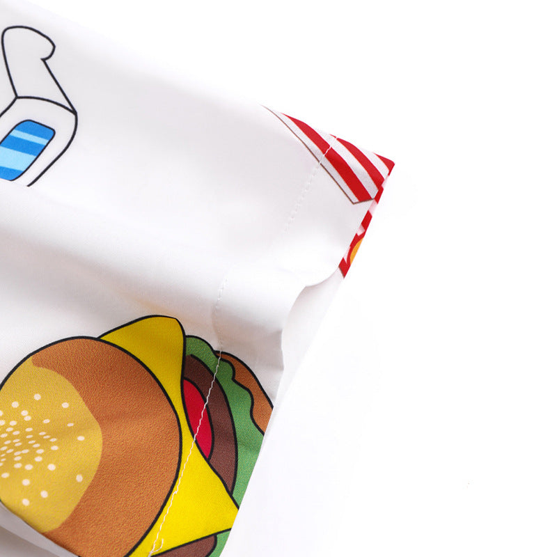 Close-up of a pillow with cartoon character and food design on a white background