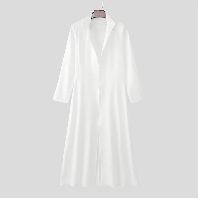 A white long-sleeve midi dress with a V-neckline, hanging on a wooden hanger against a solid light gray background.