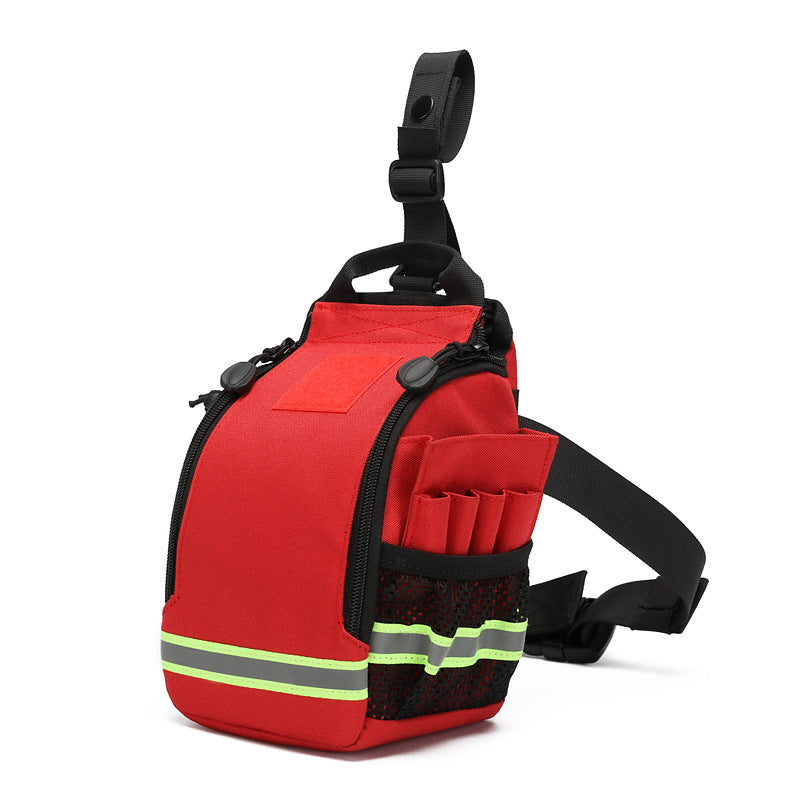 A red firefighter utility belt bag with black straps and reflective yellow-green stripes, shown on a white background.