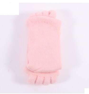Pink hot water bottle on a white background