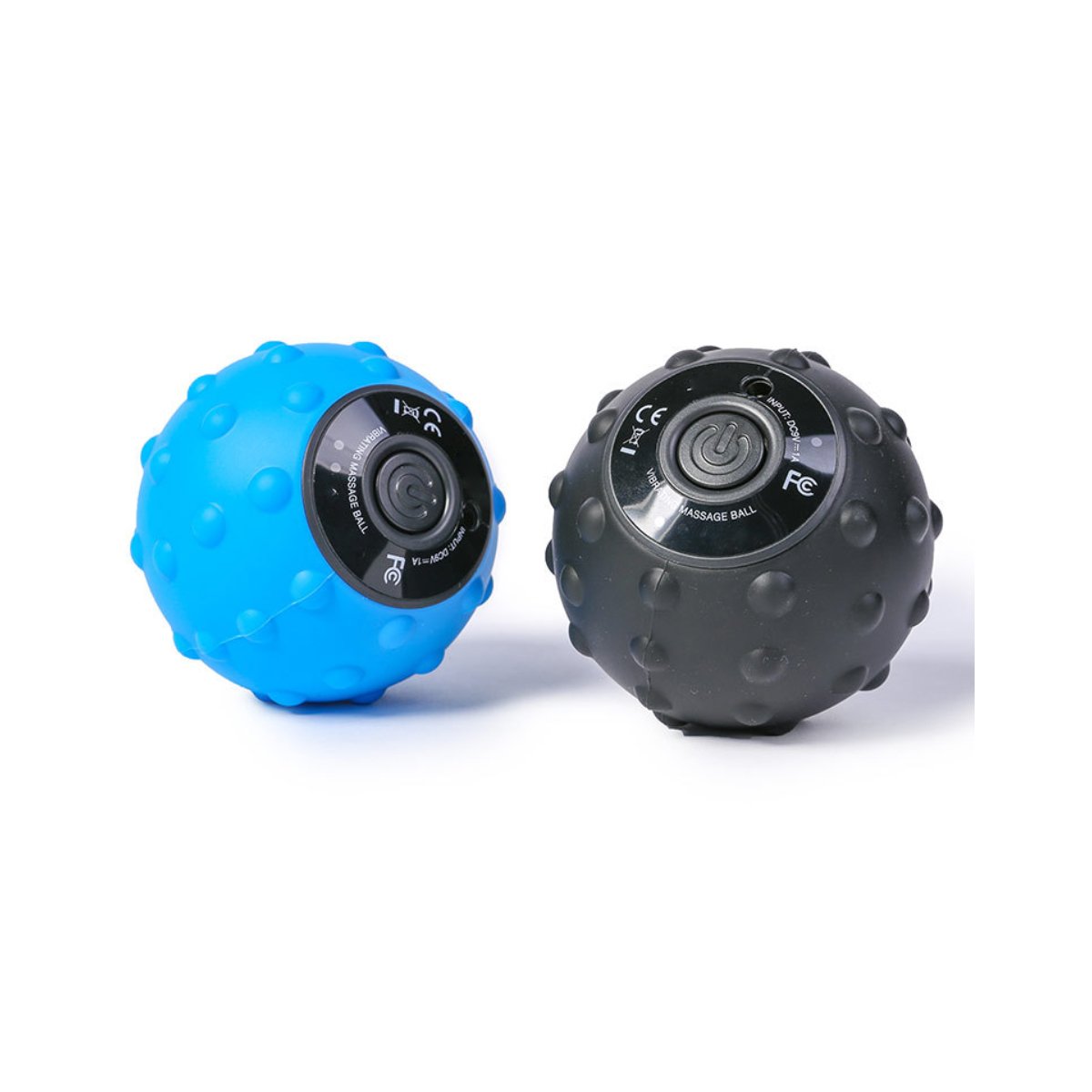 Blue and black massage ball on a white background