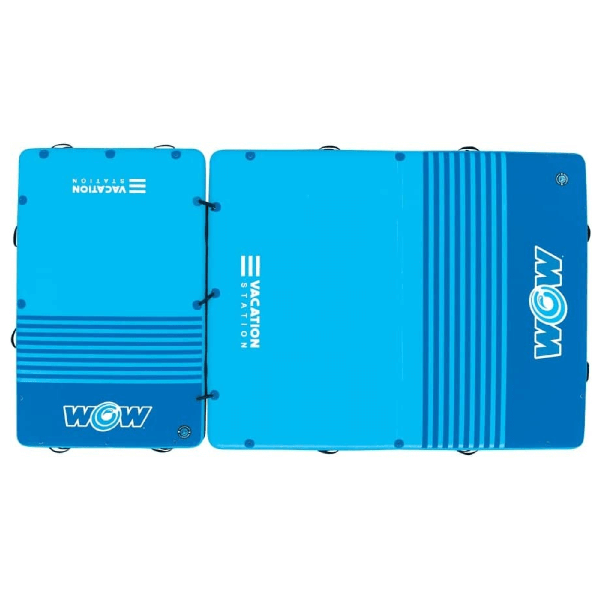 Two blue WOW mats with visible branding on a white background