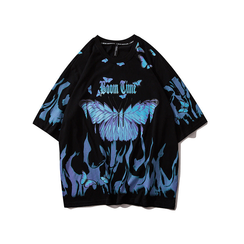 Black t-shirt with blue butterfly design and 'Boom Clap' text on a white background