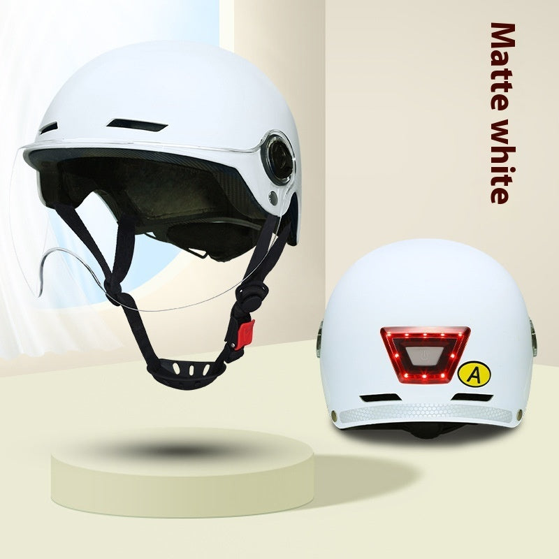 White helmet with LED lights on a beige background, labeled 'Matte white'.