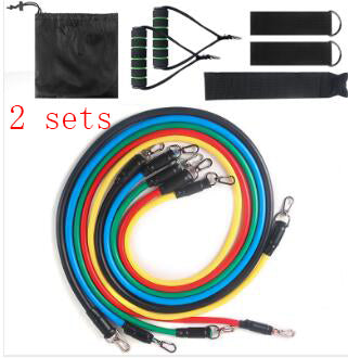Set of resistance bands with attachments on a white background