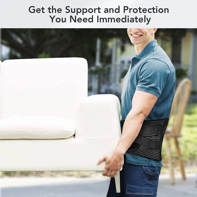 Person wearing a back brace while lifting a couch outdoors.