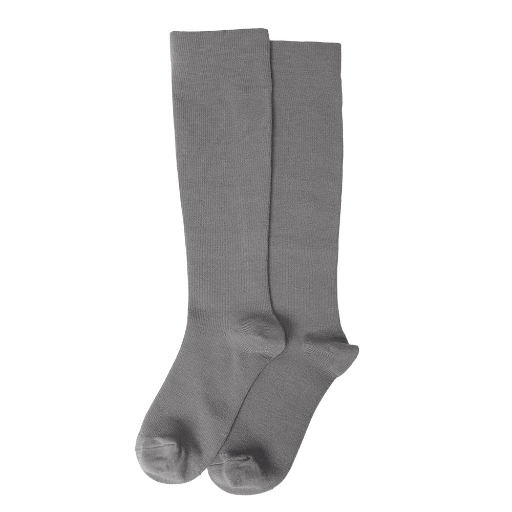 Pair of gray knee-high socks on a white background