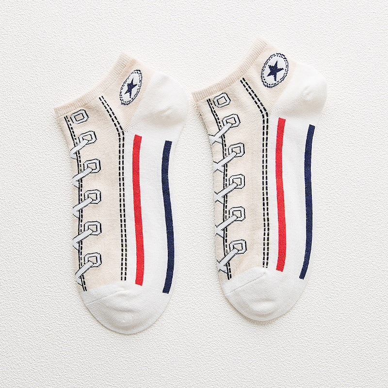 Two pairs of socks with shoe lace design on a white background