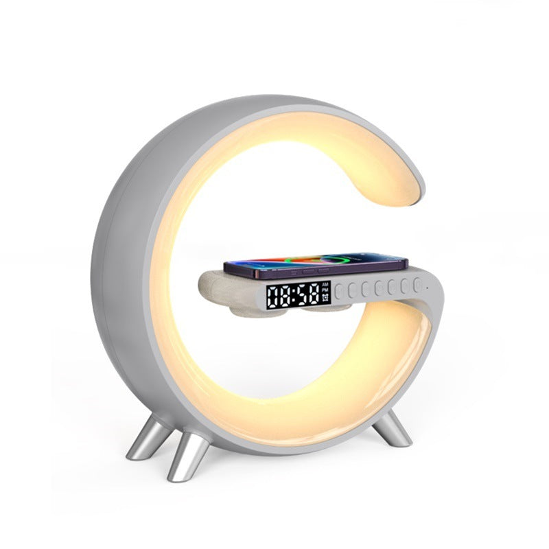 Moon-shaped night light with digital display on a white background