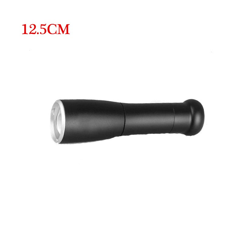 Black flashlight with white light on a white background, labeled 12.5CM.