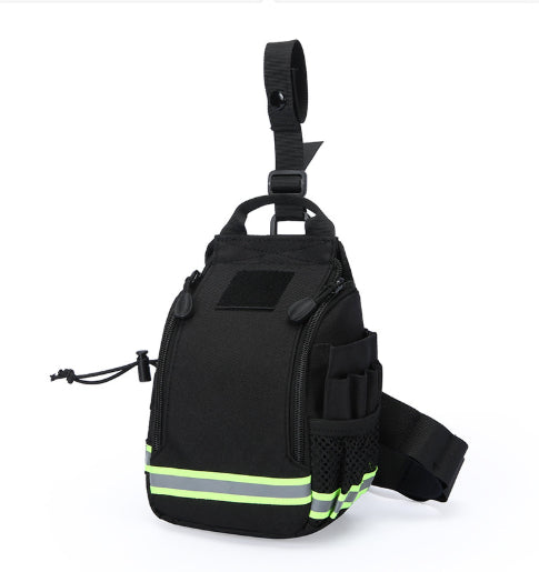 A black tactical sling bag with reflective neon green and silver stripes near the bottom, featuring a top carrying handle, side mesh pocket, and adjustable shoulder strap on a white background.