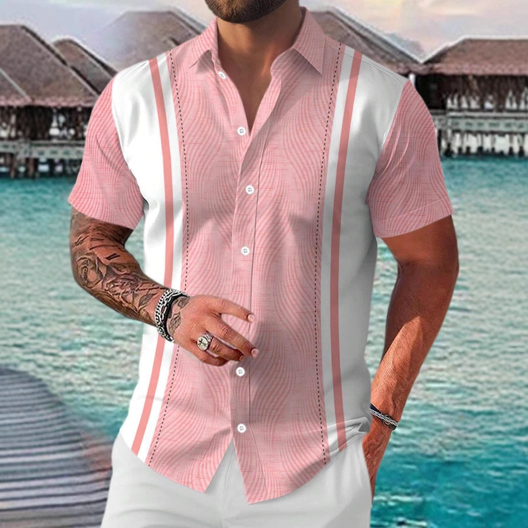 Man wearing a pink and white patterned shirt with a waterfront background