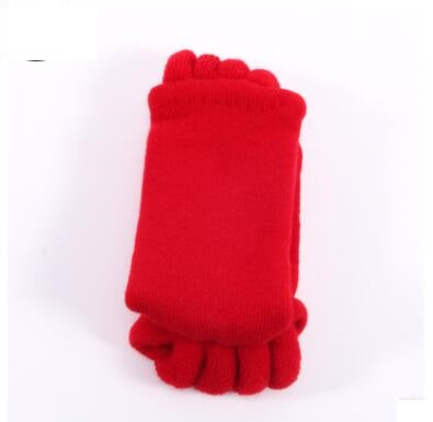 Red knitted socks on a white background