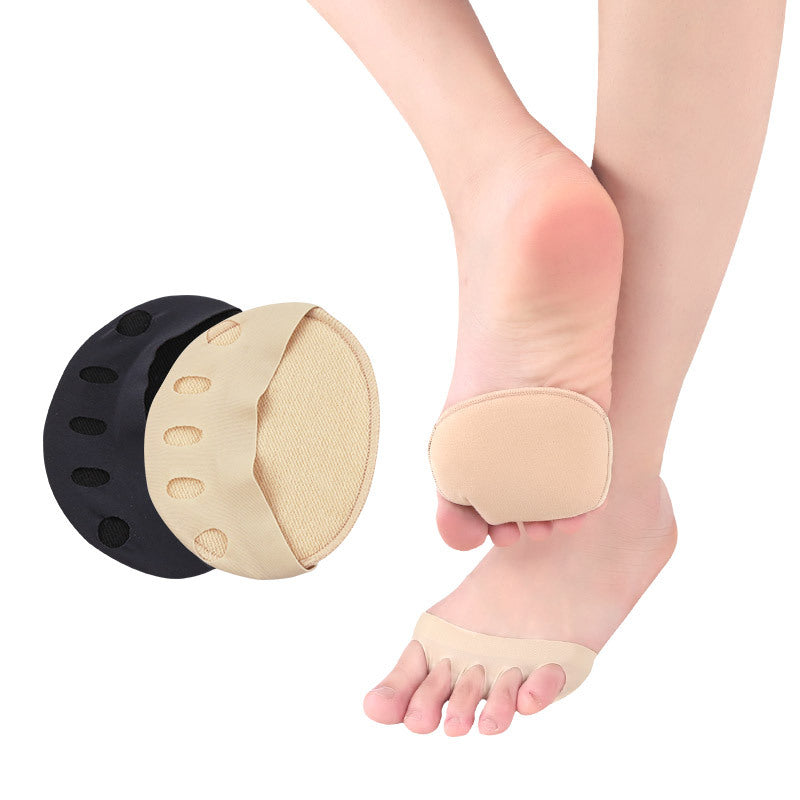 Two pairs of toe separators with a foot wearing one of them on a white background