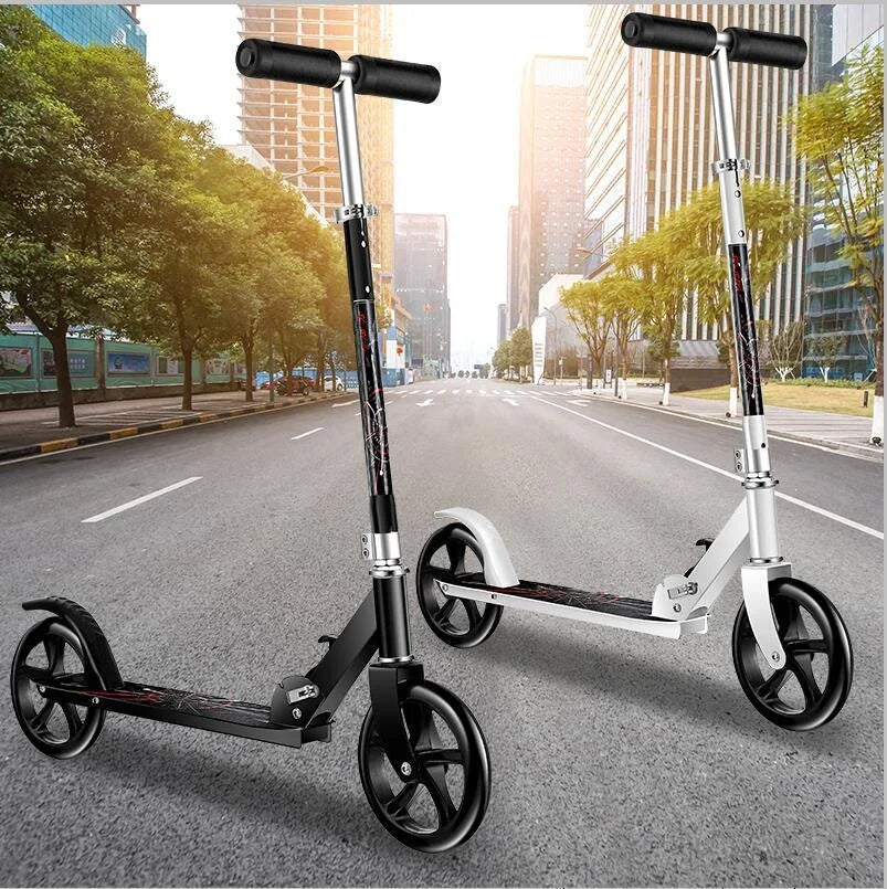 Black and white folding kick scooters displayed against a city street background.