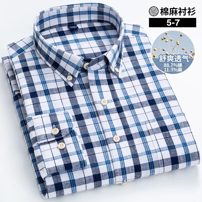 Folded blue and white checkered shirt with text on a light background