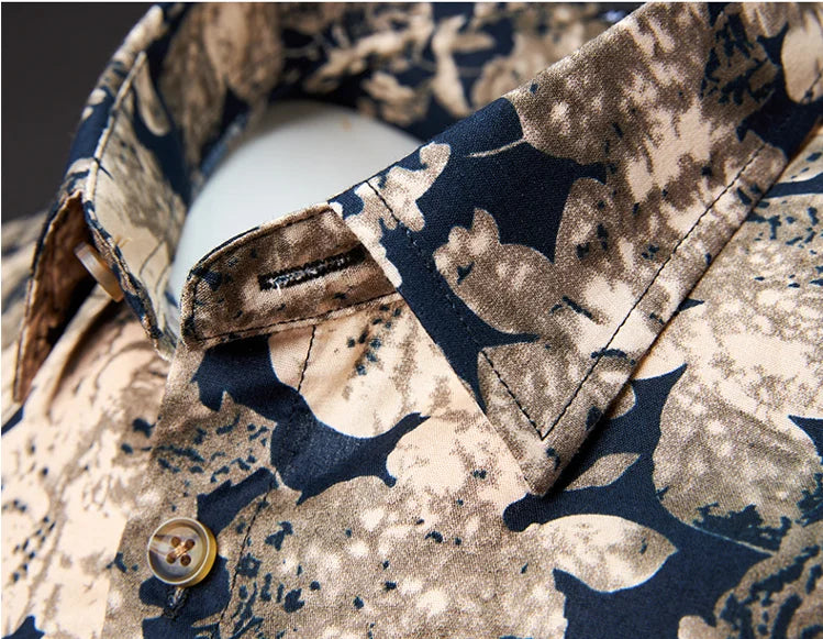 Close-up of a patterned shirt with a button and label.