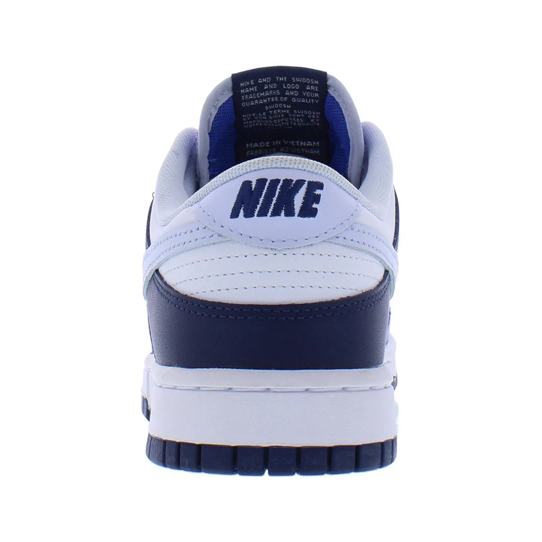 White and navy blue Nike sneaker with visible branding on a white background