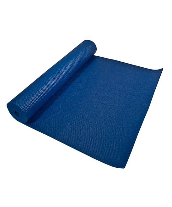 Blue yoga mat rolled up on a white background
