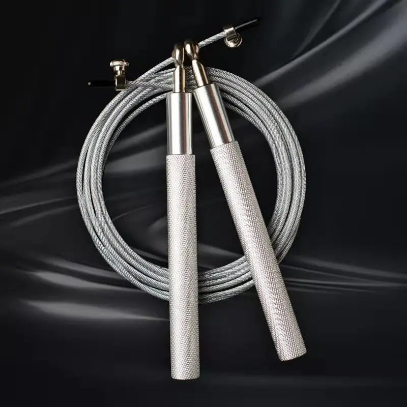 Silver jump rope on a dark background