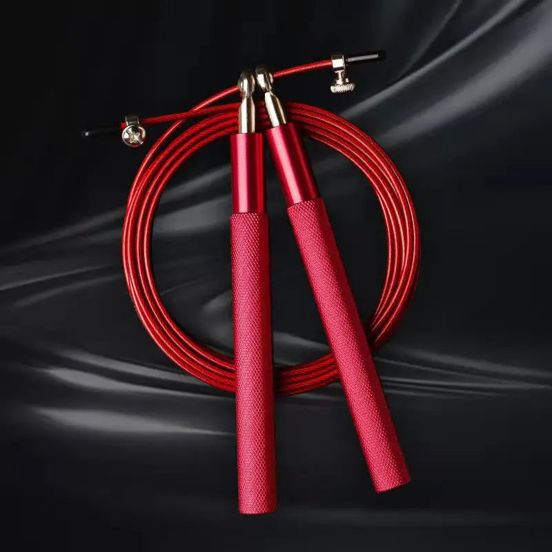 Red jump rope on a black background