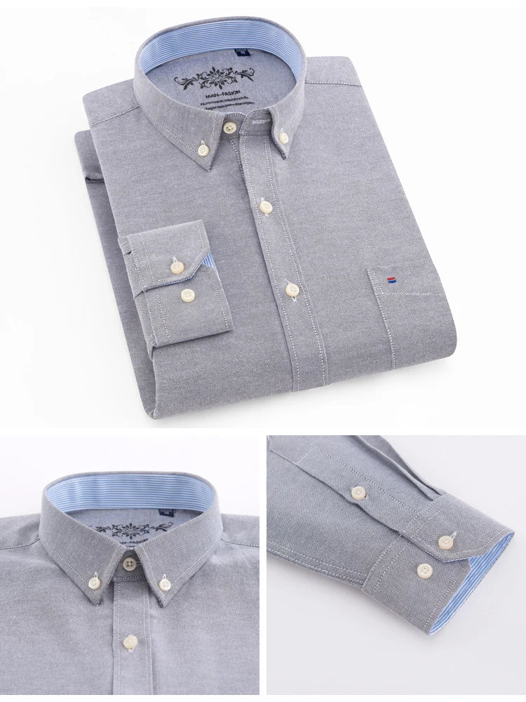 Gray button-up shirt with blue collar and trim on a white background