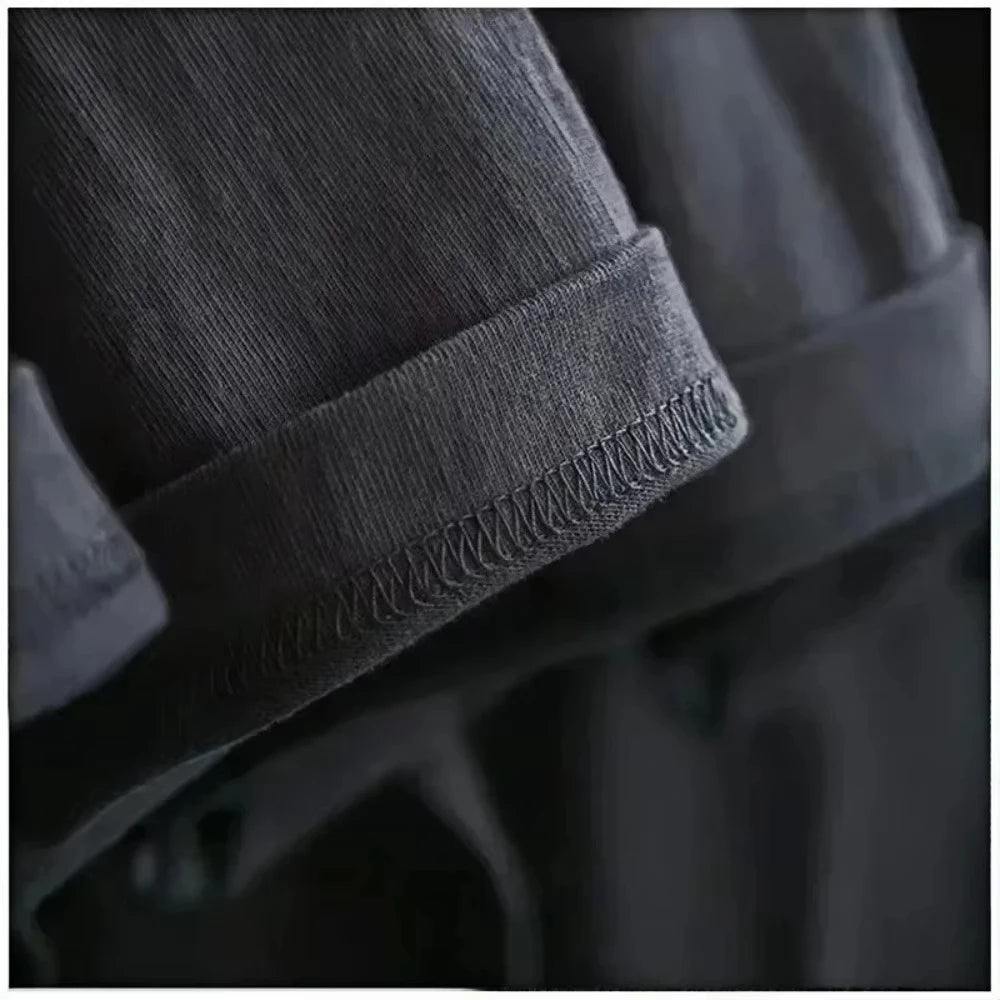 Close-up of a dark gray fabric with stitching detail