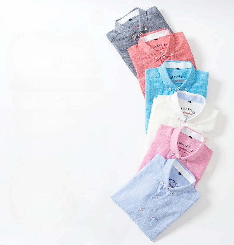 Collection of colorful polo shirts on a white background