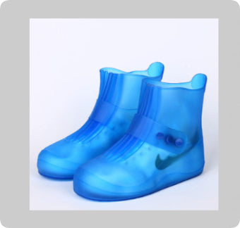 Blue rain boots on a white background