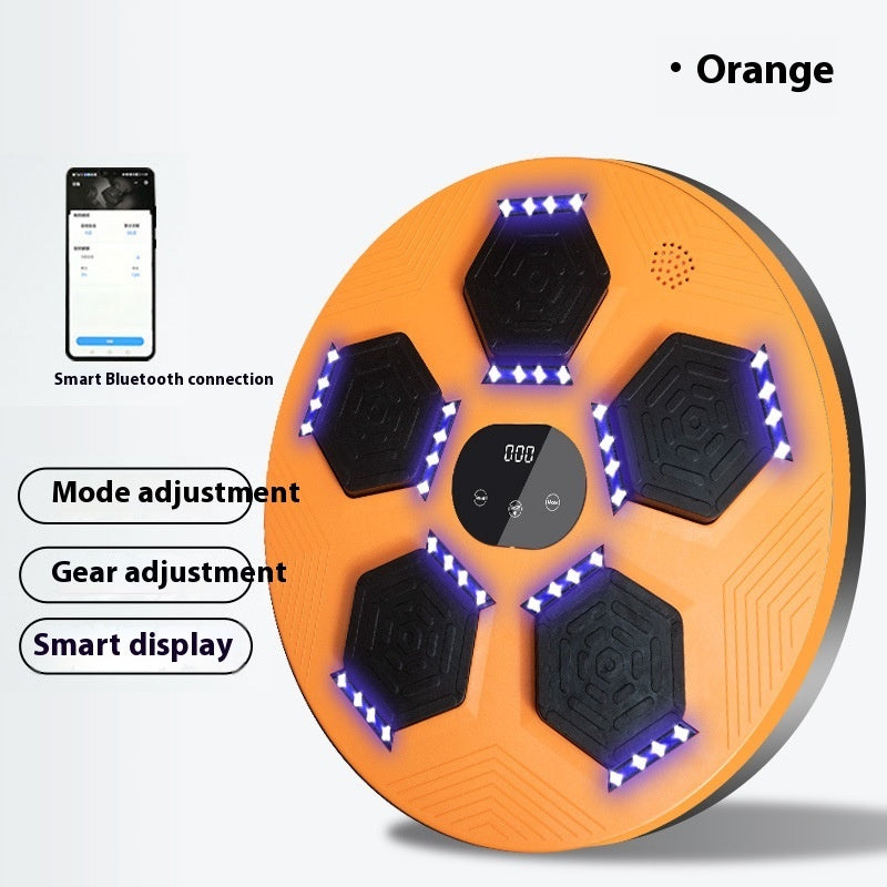 Orange exercise board with LED lights and digital display on a white background