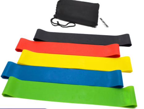 Set of colorful resistance bands with a black carrying case on a white background