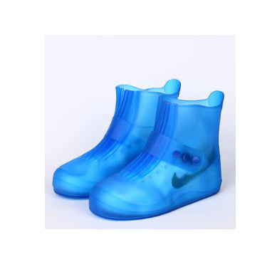 Blue rain boot covers with a Nike logo on a white background