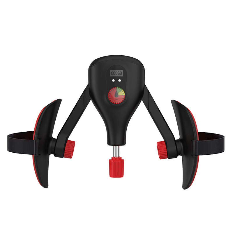 Black and red kegal device on a white background