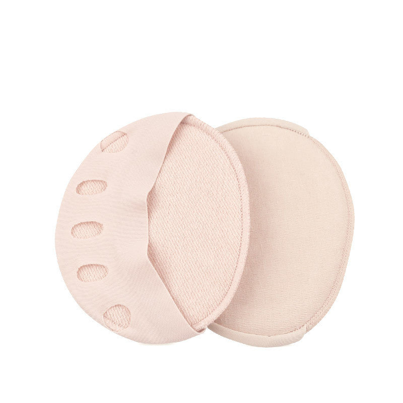 Pair of light pink silicone foot-shaped products on a white background