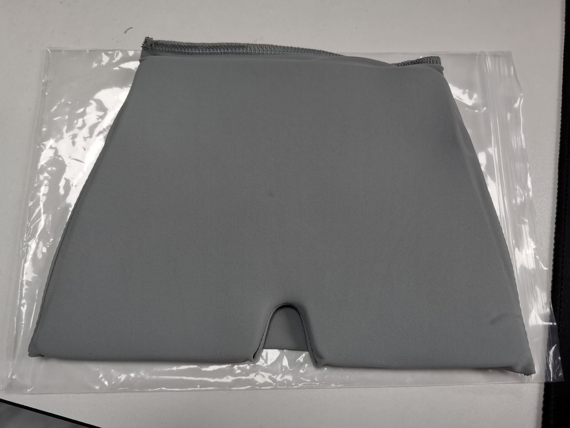 Gray gel headband on a white background