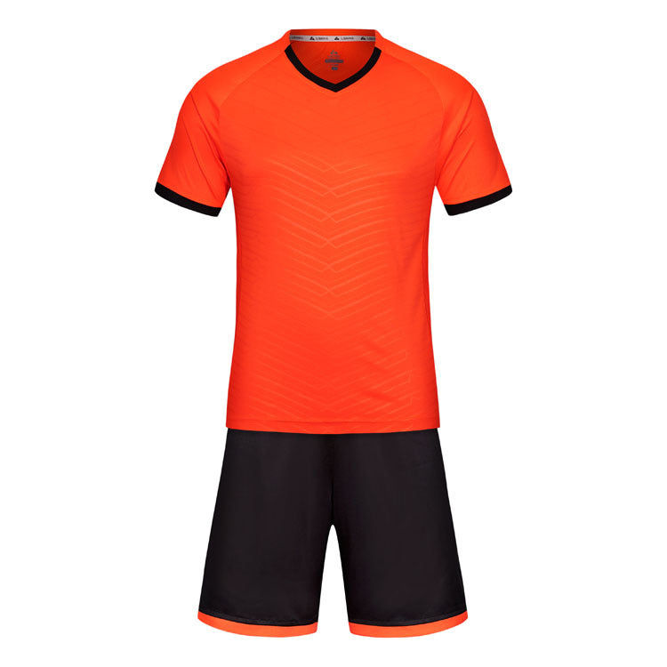 Orange sports jersey and black shorts set on a white background