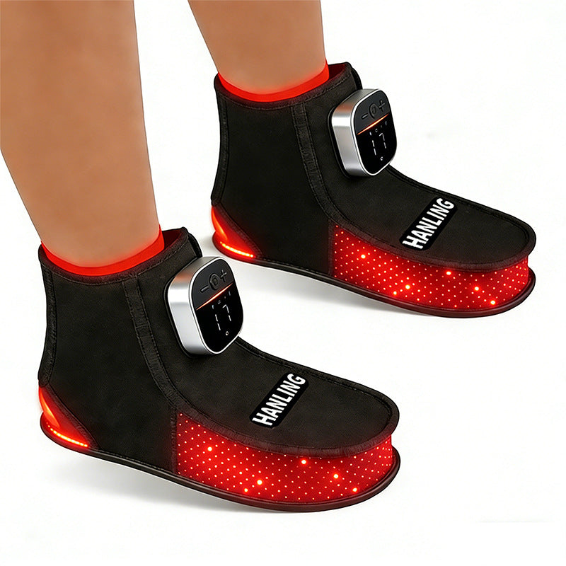Black and red massage shoes with digital controls on a white background