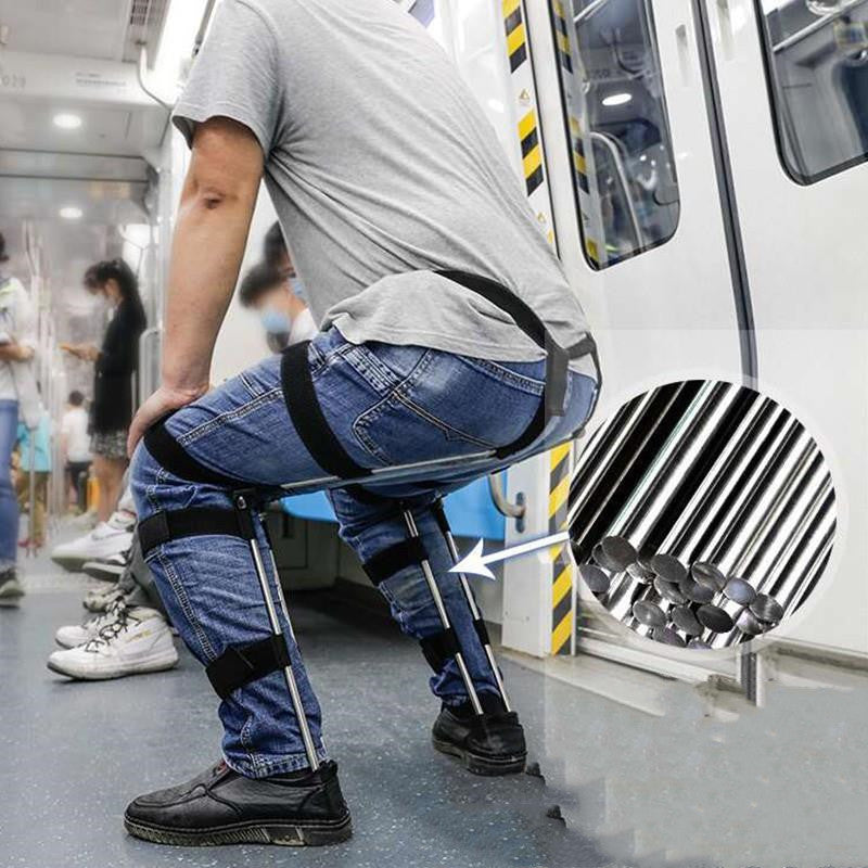 Person using a chair-like device on a subway train