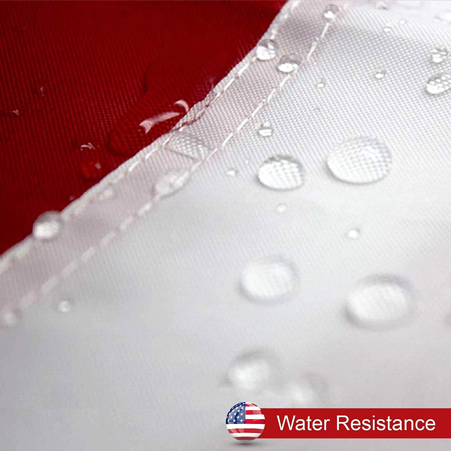 Close-up of water droplets on a fabric with 'Water Resistance' label.
