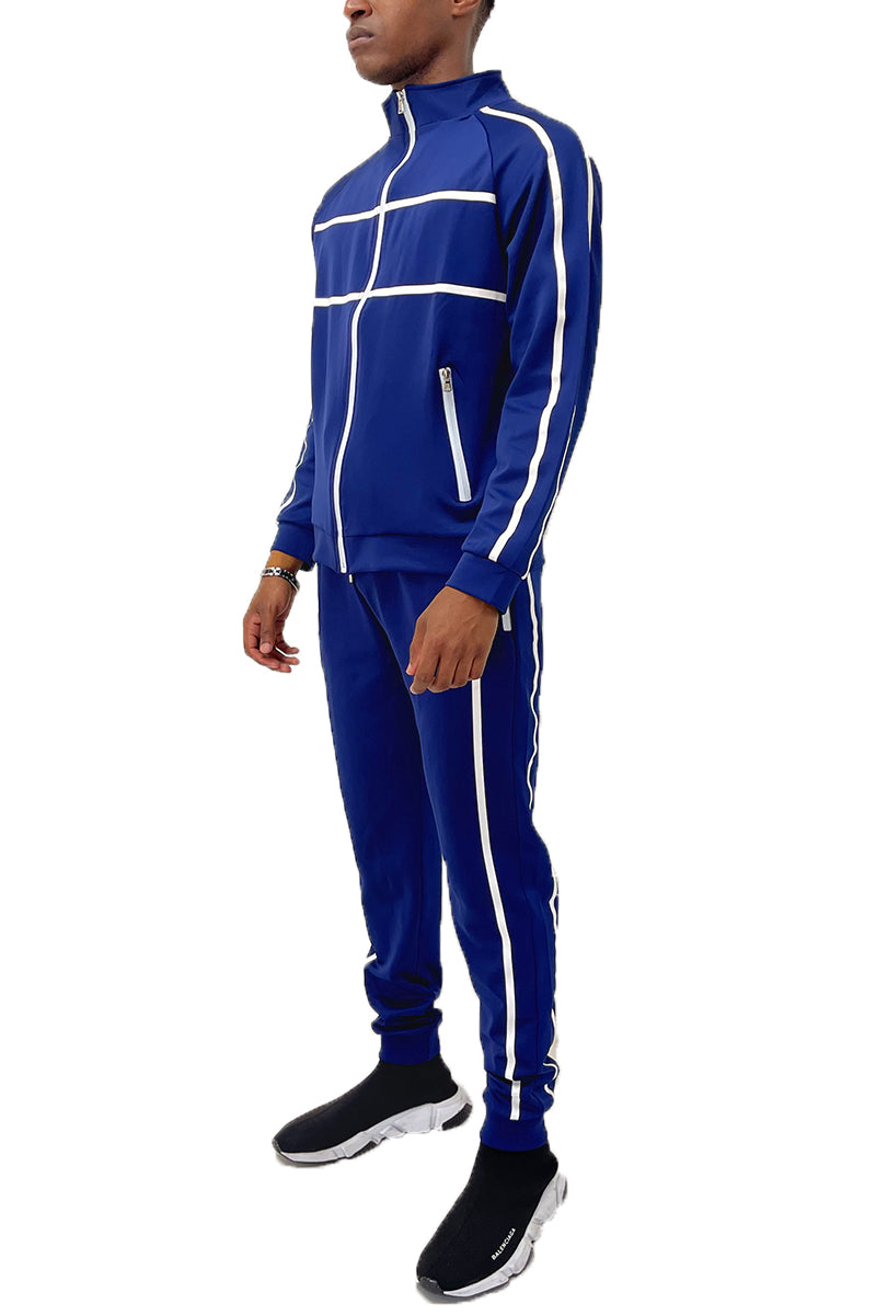 Person wearing a blue tracksuit with white stripes on a white background