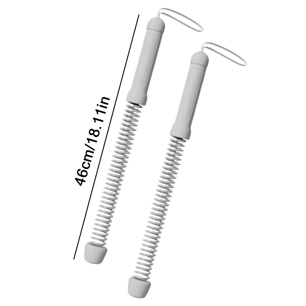 Two white spring-loaded tools with measurement text on a white background
